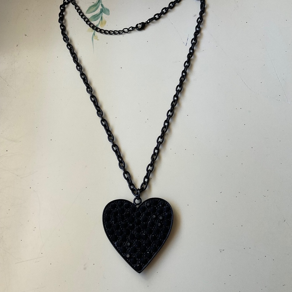 Vintage black heart necklace, matte black chain, black crystals on front, 20”.